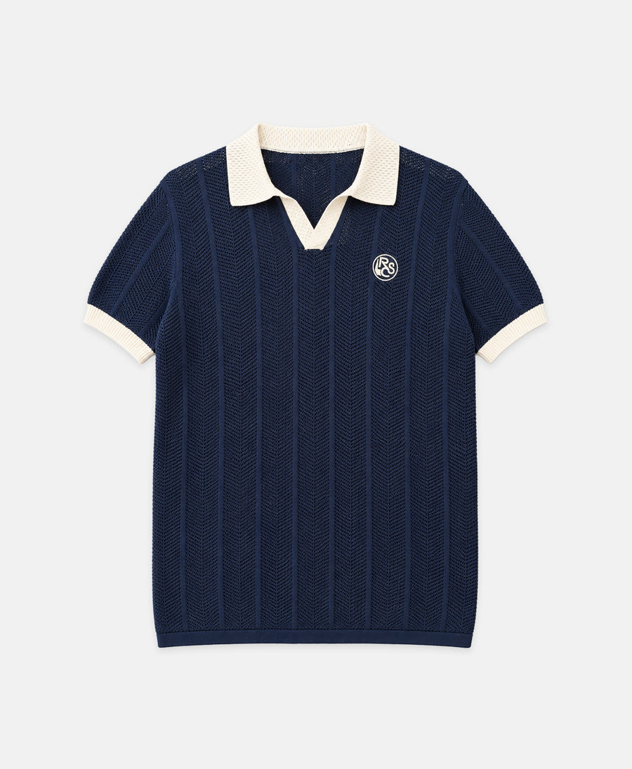 Polo de punto azul marino